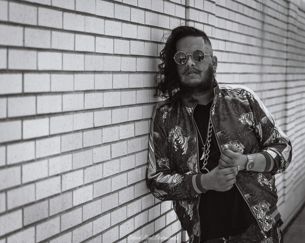Alt text: Natural light portrait of a male model known as Streetwear Sultan, photographed on June 28, 2025. He is dressed in stylish urban streetwear, captured outdoors with soft lighting and a confident, expressive pose.